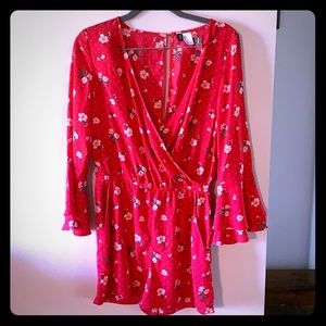 Floral romper with pockets.